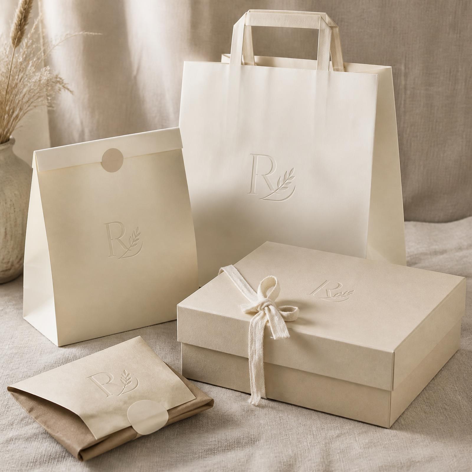 R3Med branded paper bags with pastries